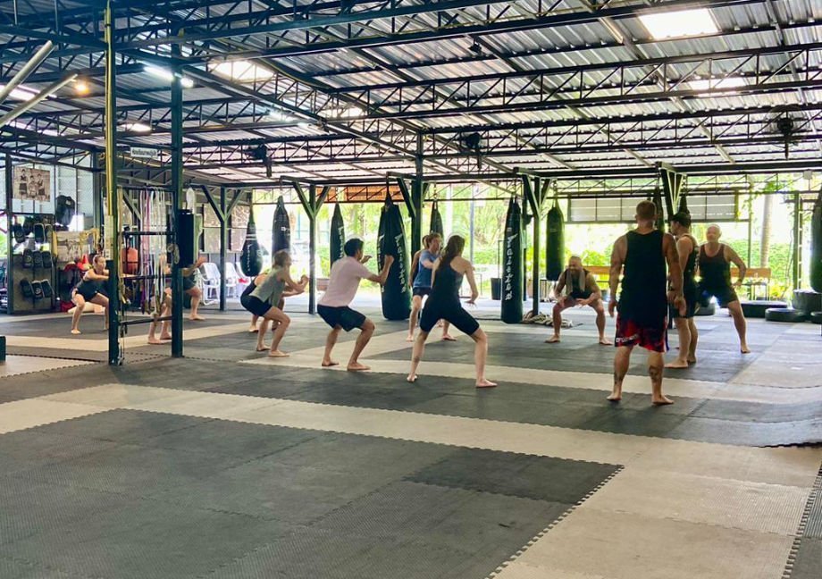 Inpatient addiction treatment residents exercise together at One Step fitness center