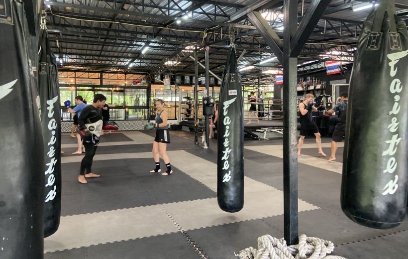 Wendy trains with coach at large fitness camp