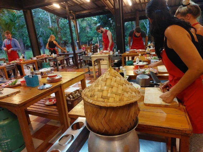 Making delicious Thai food at outdoor cooking class