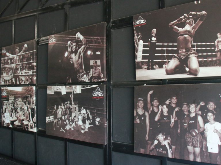 Printed photos of Muay Thai training and fun