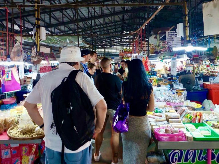 Thai rehab residents visit local market to buy fresh produce