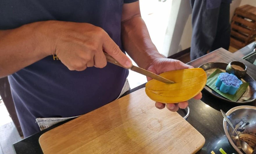 Preparing mango desserts at Thai home cooking school