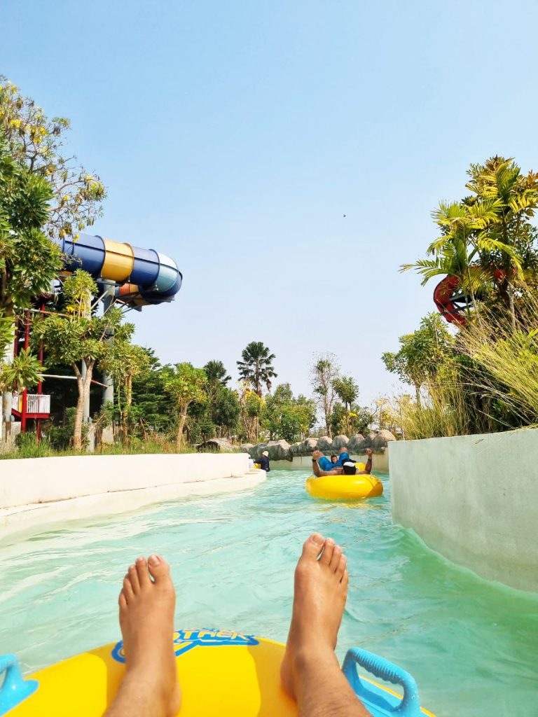 Riding down the stream on inflatable raft