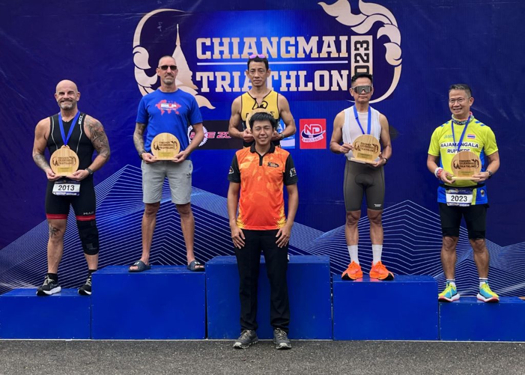 On the podium after a local triathlon event