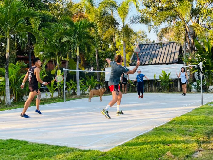 Ketamine recovery group play badminton in garden of One Step rehab