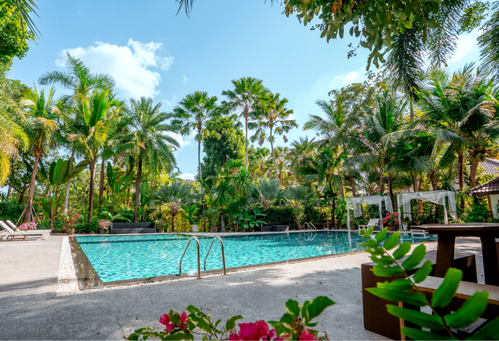 Private swimming pool and tropical gardens at One Step Rehab in Thailand, offering a calm environment for drug addiction treatment