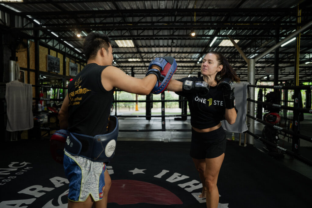 Muay Thai pad work training at One Step Rehab, Chiang Mai