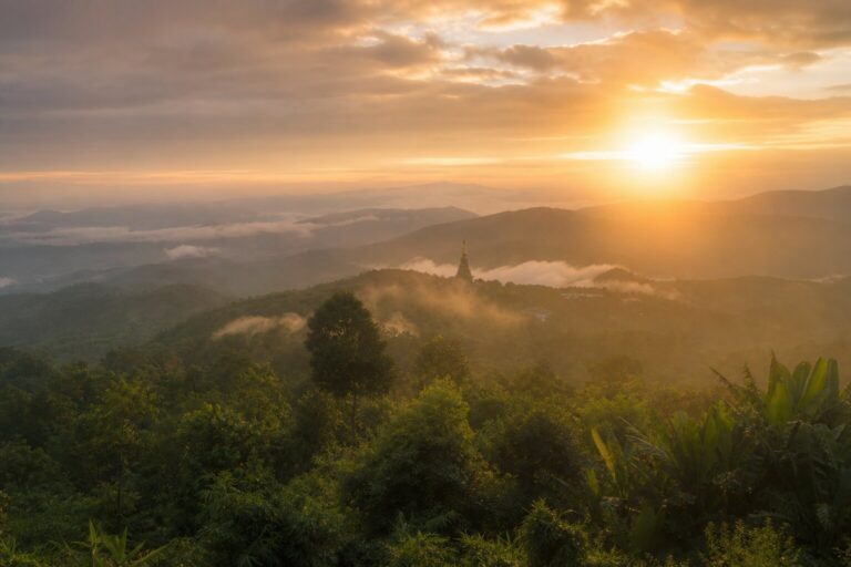 Sunrise over Chiang Mai mountains and temples representing hope and new beginnings