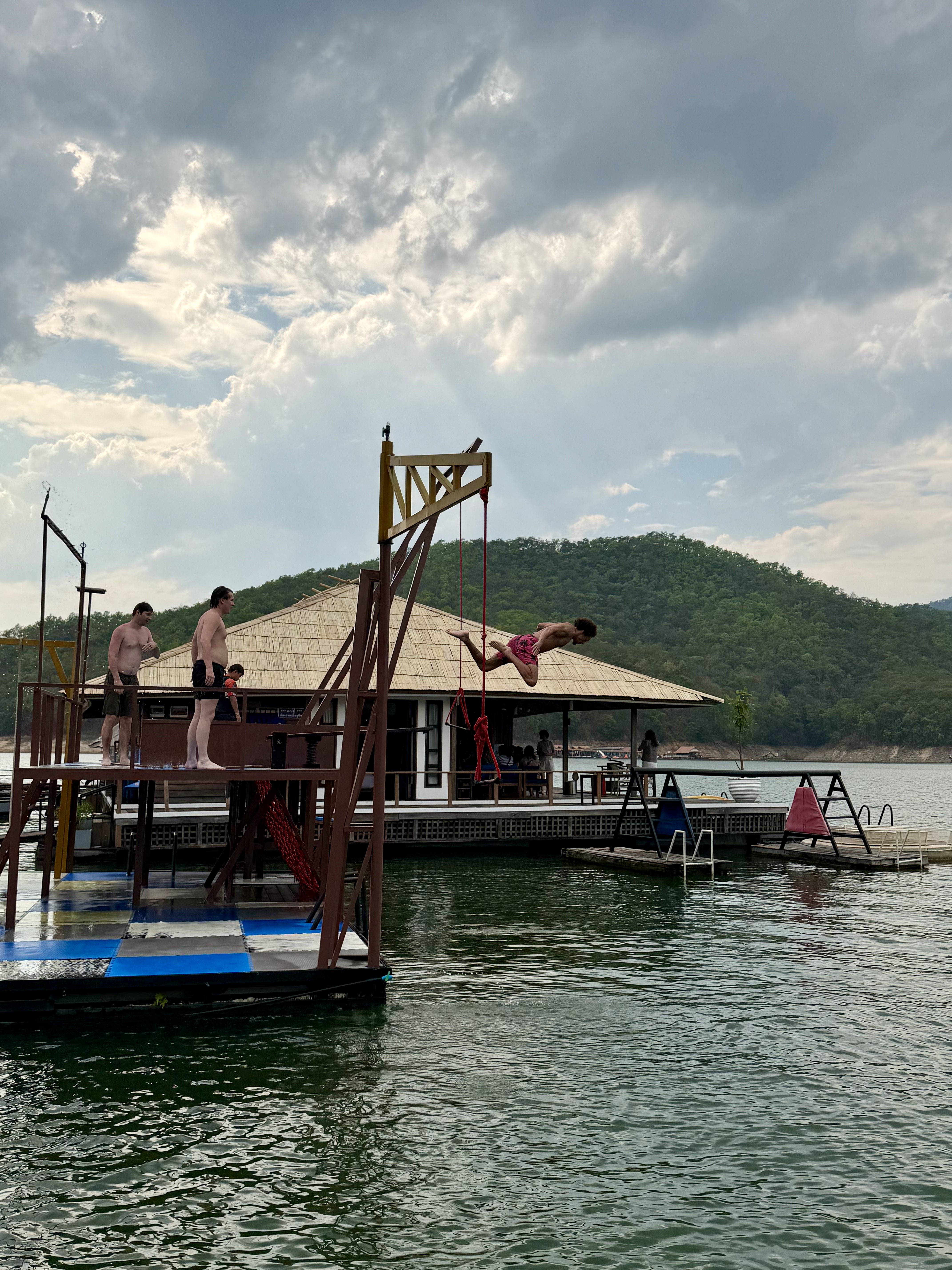 Dock diving during a lake day trip