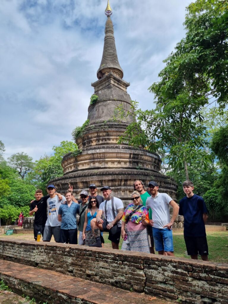 Group photo at a historical chedi near Chiang Mai